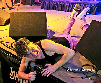 Jimmy Nick sprawled on stage