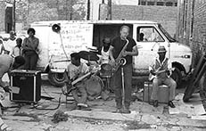 Sax player with Mississippi van
