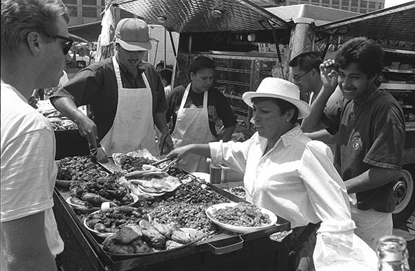Woman at grill