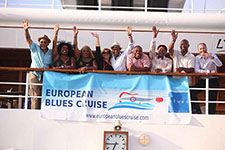 European Blues Cruise gang by boat banner